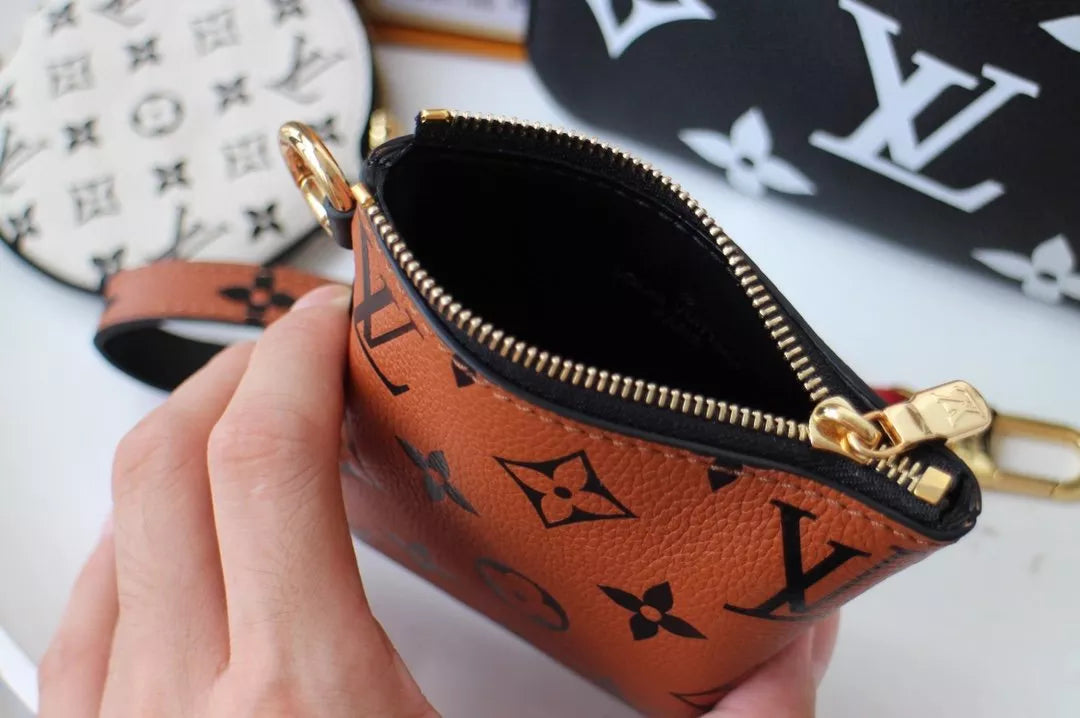 LOUIS VUITTON 19.5 X 11.5 X 3.0 CM CRAFTY TRIO BAG