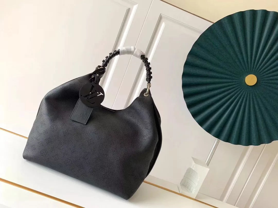 LOUIS VUITTON 35X40X17CM TAURILLON CALFSKIN