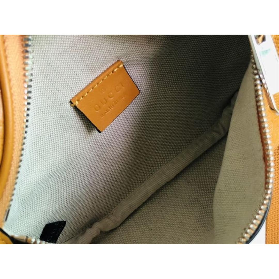 GUCCI GG EMBOSSED BELT BAG