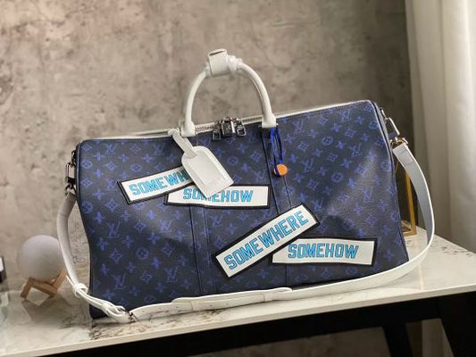 LOUIS VUITTON 50 X 29 X 23 CM KEEPALL BANDOULIÈRE 50 MONOGRAM SOMEWHERE SOMEHOW
