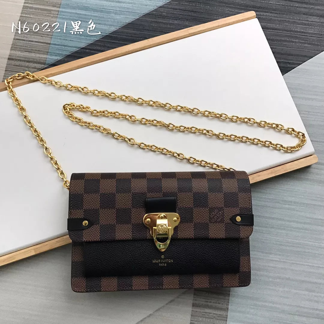 LOUIS VUITTON VAVIN CHAIN WALLET