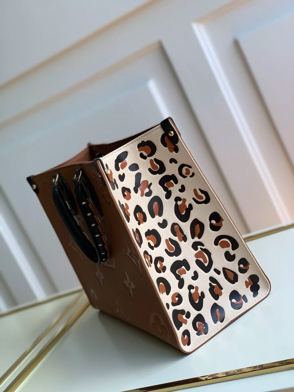 LOUIS VUITTON MM ONTHEGO WILD AT HEART MONOGRAM EMPREINTE 35X27X14CM 2COLORS