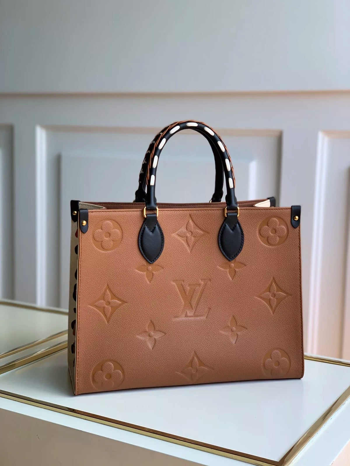 LOUIS VUITTON MM ONTHEGO WILD AT HEART MONOGRAM EMPREINTE 35X27X14CM 2COLORS