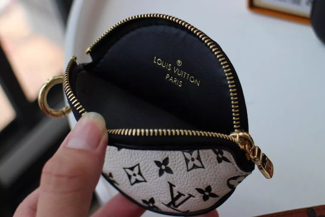 LOUIS VUITTON 19.5 X 11.5 X 3.0 CM CRAFTY TRIO BAG