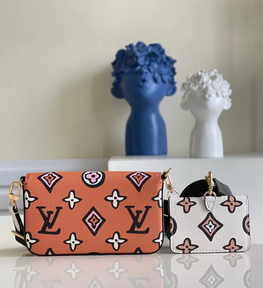 LOUIS VUITTON WILD AT HEART MULTI CHETTE FÉLICIE 17X9.6X3.5CM