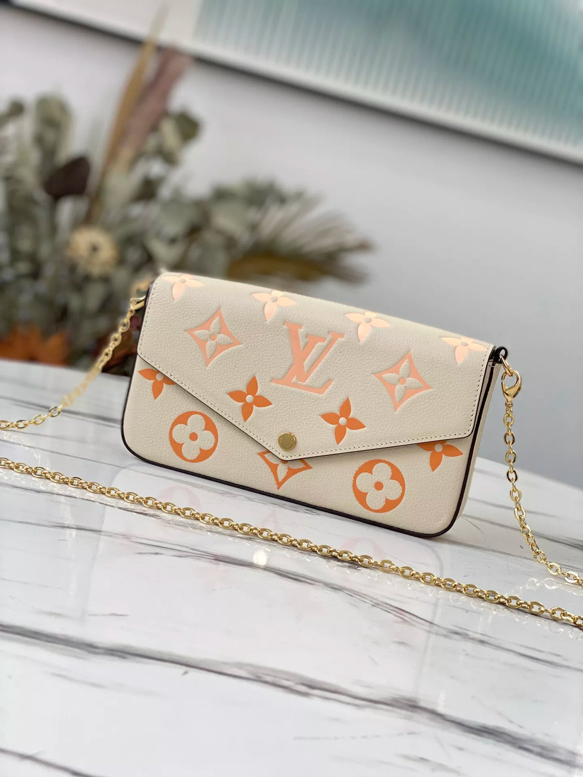 LOUIS VUITTON 21X12X3CM BY THE POOL FÉLICIE POCHETTE