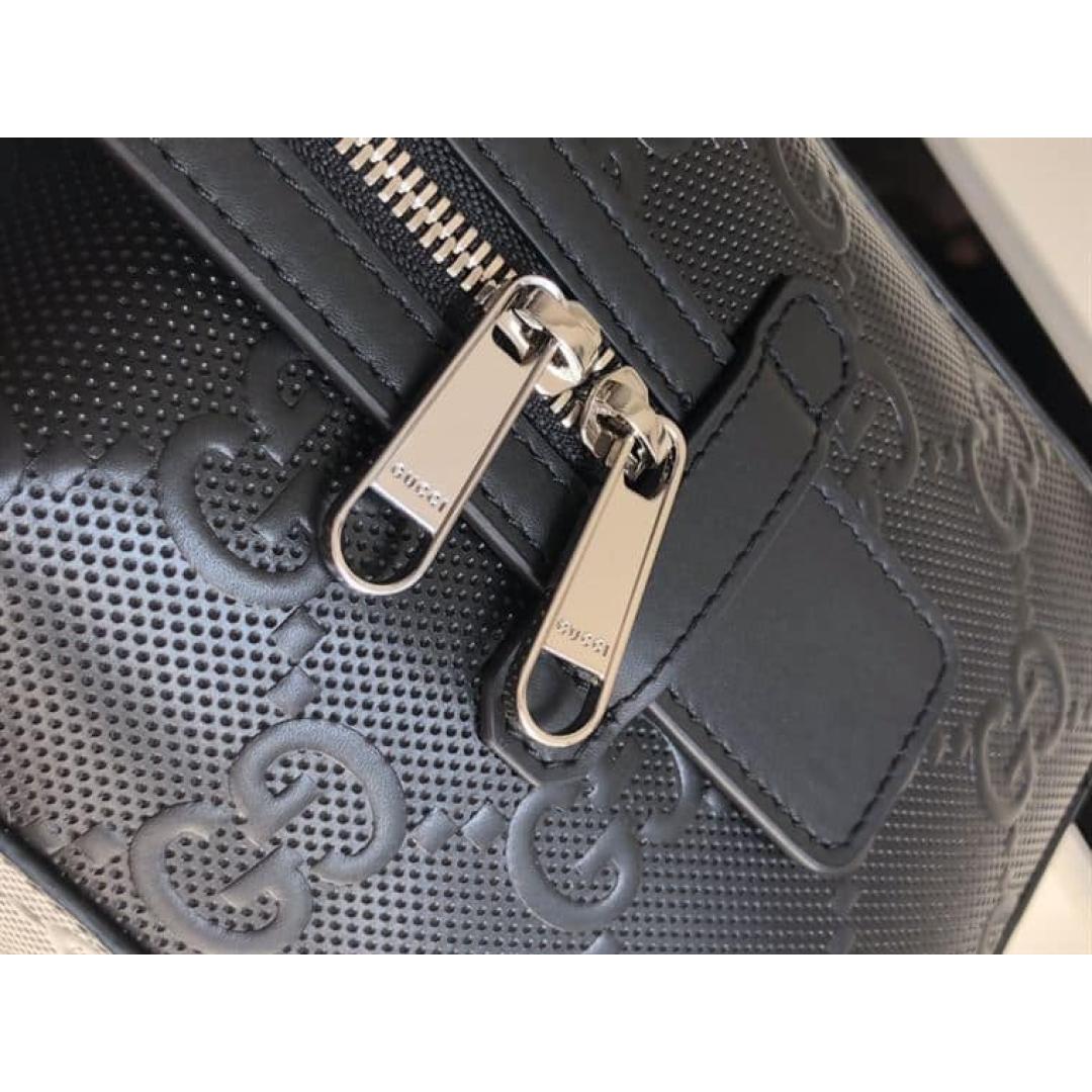 GUCCI GG EMBOSSED DUFFLE BAG