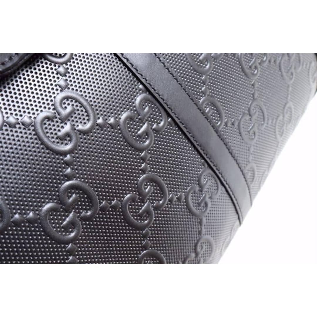 GUCCI GG EMBOSSED DUFFLE BAG