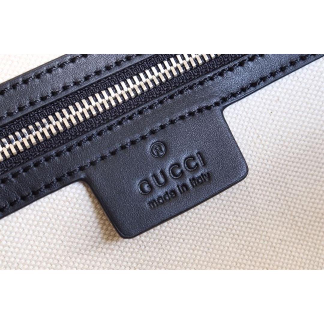 GUCCI GG EMBOSSED DUFFLE BAG