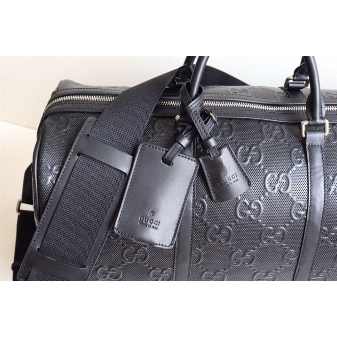 GUCCI GG EMBOSSED DUFFLE BAG
