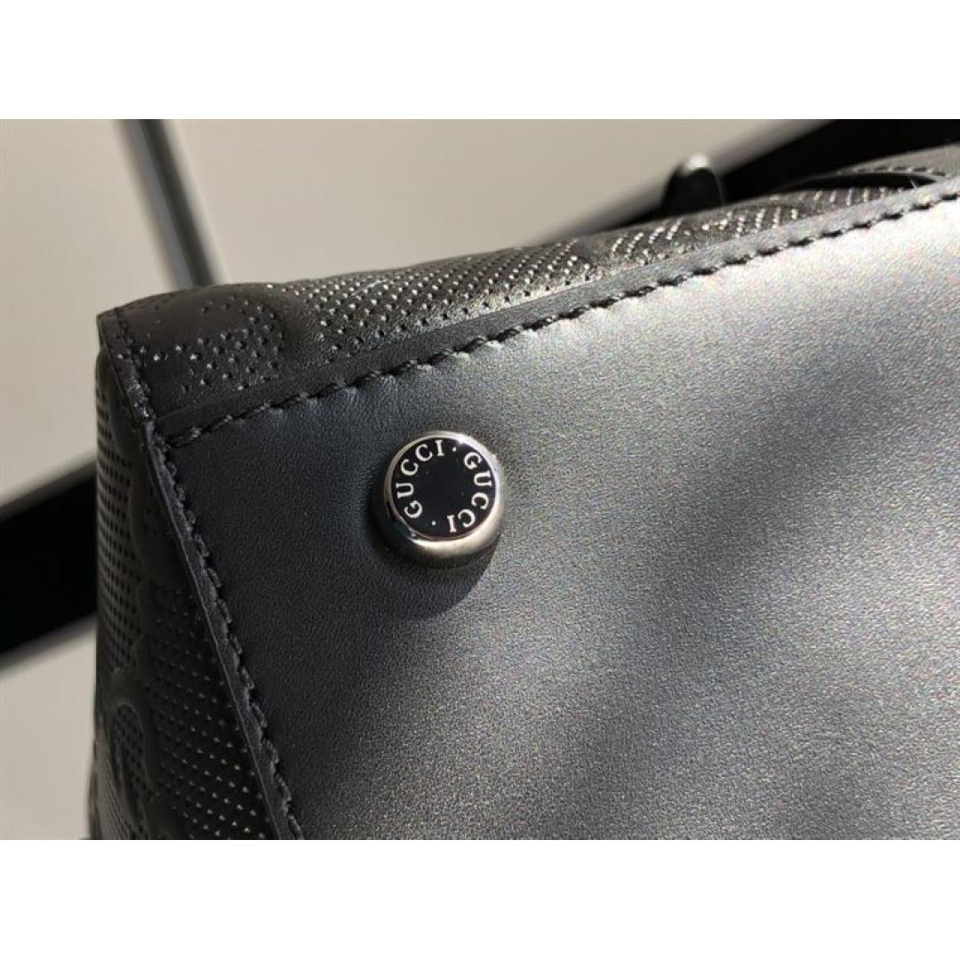 GUCCI GG EMBOSSED DUFFLE BAG