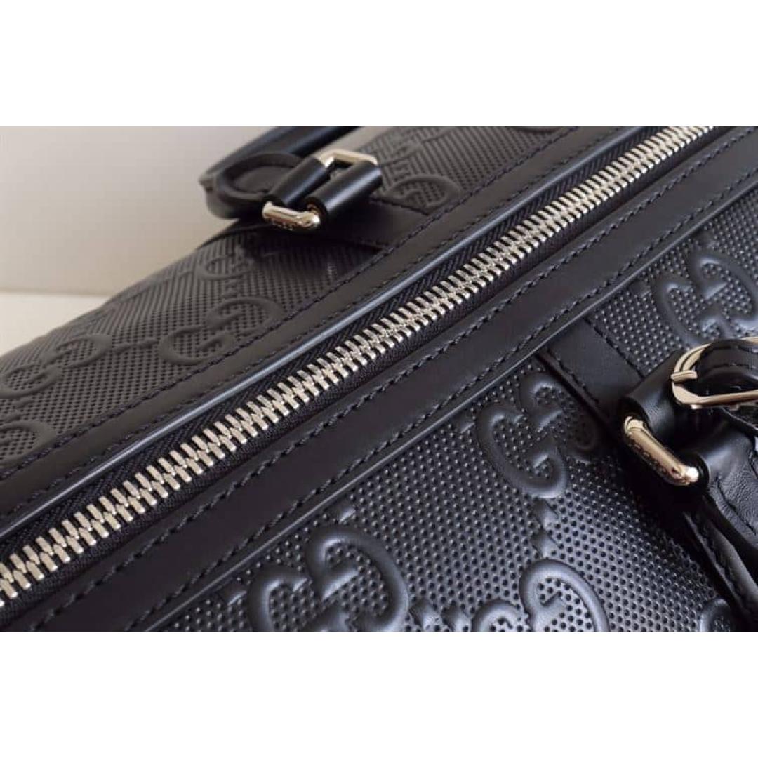 GUCCI GG EMBOSSED DUFFLE BAG