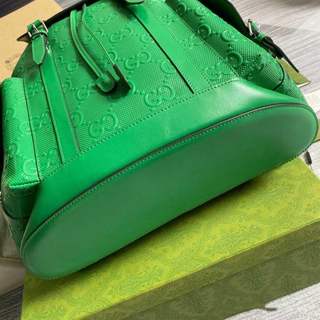 GUCCI GG EMBOSSED BACKPACK IN GREEN LEATHER