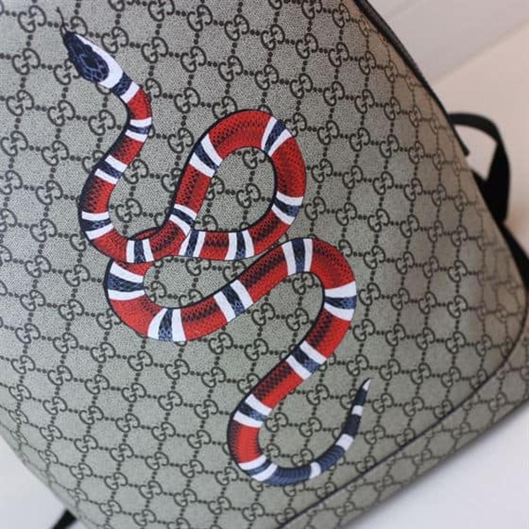 GUCCI GG BACKPACK WITH SNAKE