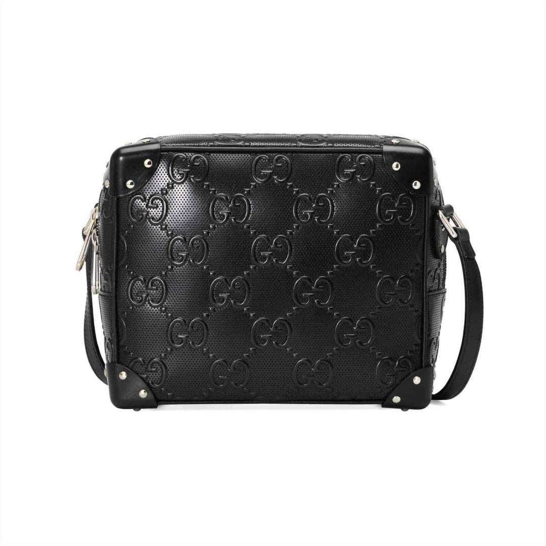 GUCCI GG EMBOSSED SHOULDER BAG IN BLACK LEATHER