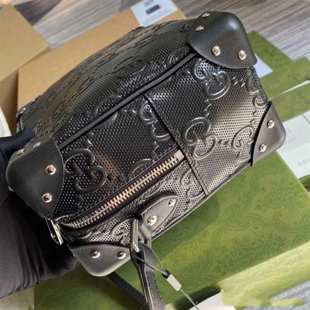 GUCCI GG EMBOSSED SHOULDER BAG IN BLACK LEATHER