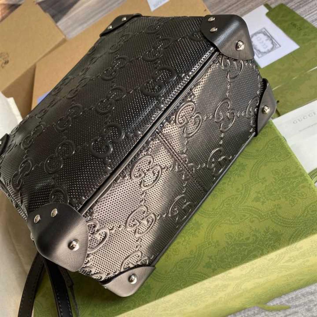 GUCCI GG EMBOSSED SHOULDER BAG IN BLACK LEATHER