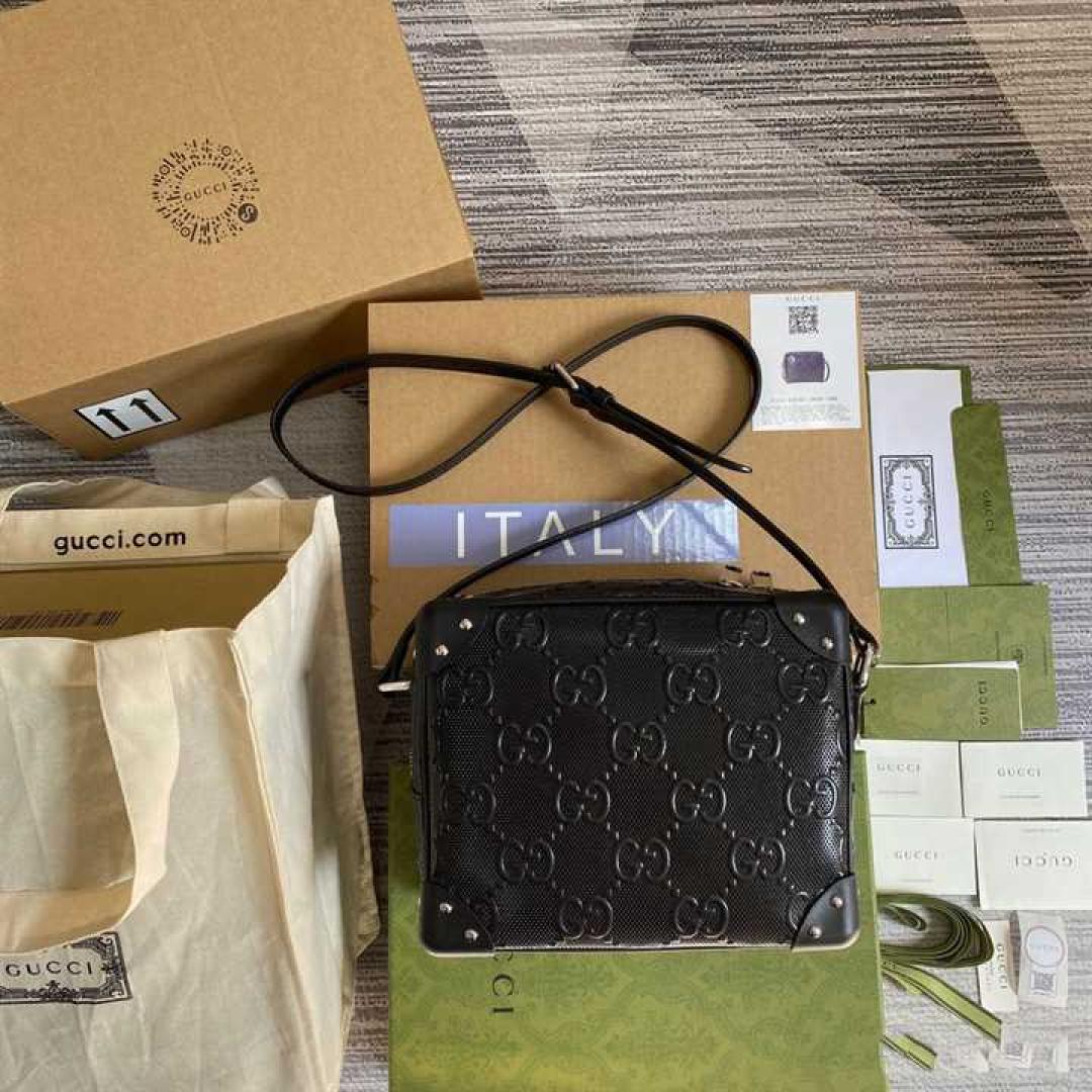 GUCCI GG EMBOSSED SHOULDER BAG IN BLACK LEATHER