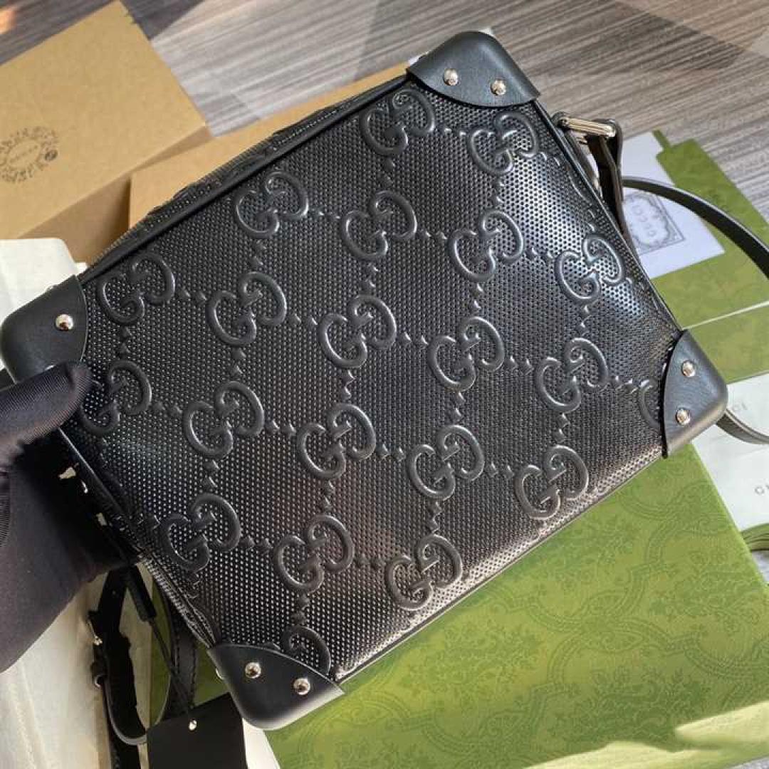 GUCCI GG EMBOSSED SHOULDER BAG IN BLACK LEATHER