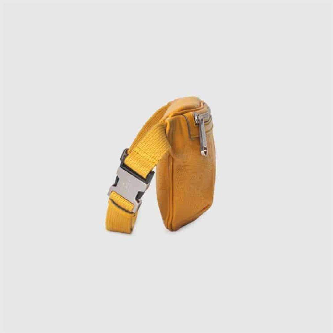 GUCCI GG EMBOSSED BELT BAG