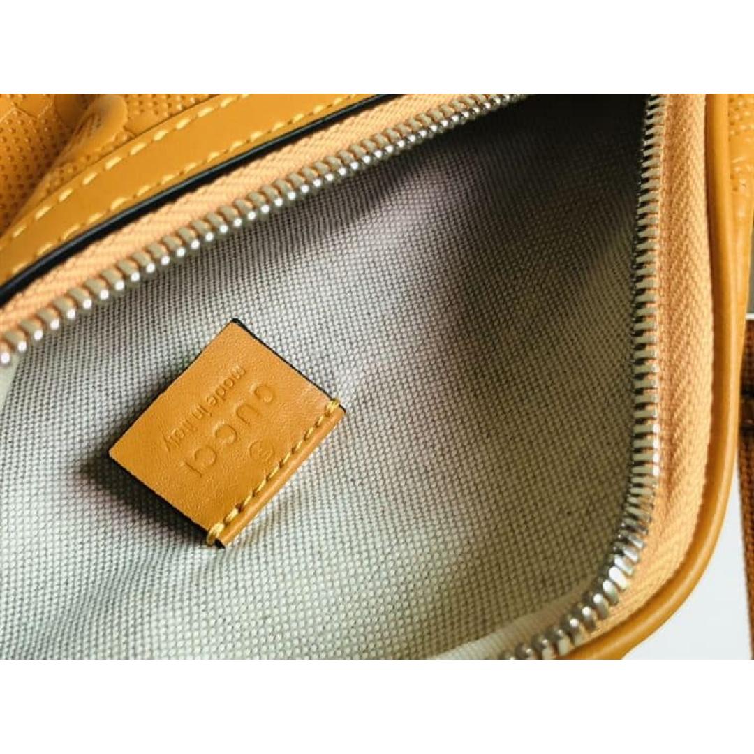 GUCCI GG EMBOSSED BELT BAG