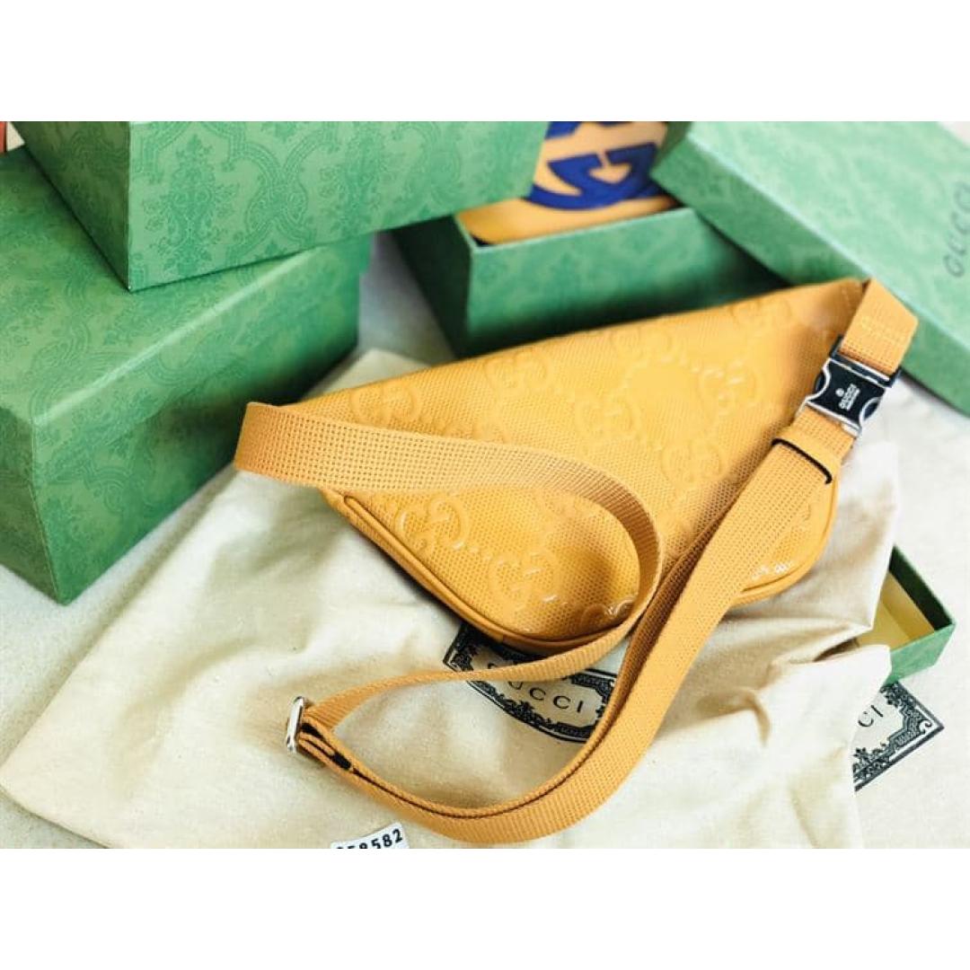 GUCCI GG EMBOSSED BELT BAG
