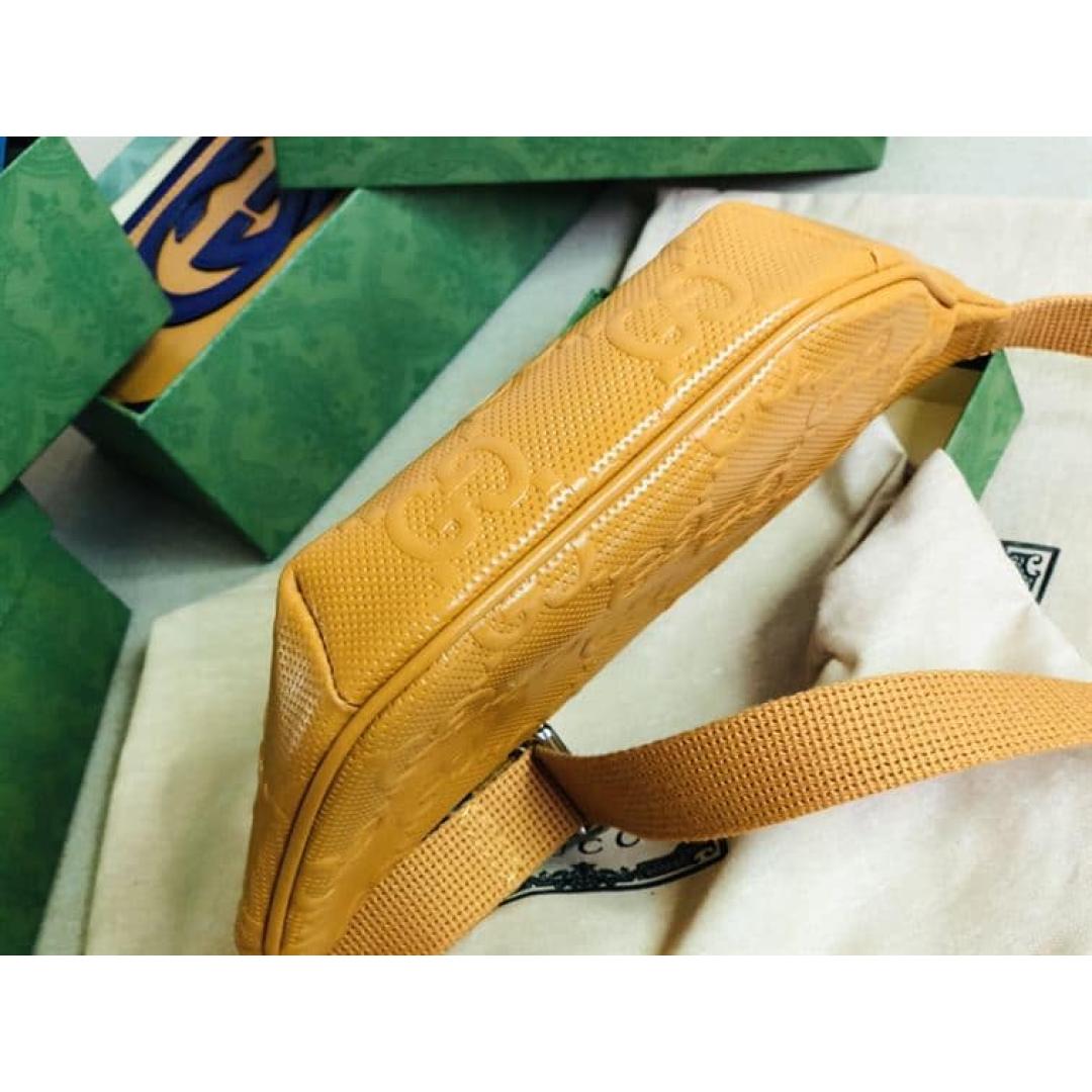 GUCCI GG EMBOSSED BELT BAG