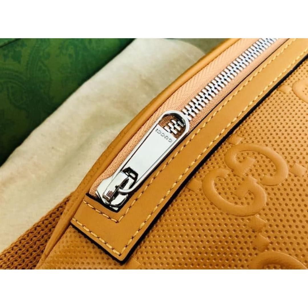 GUCCI GG EMBOSSED BELT BAG
