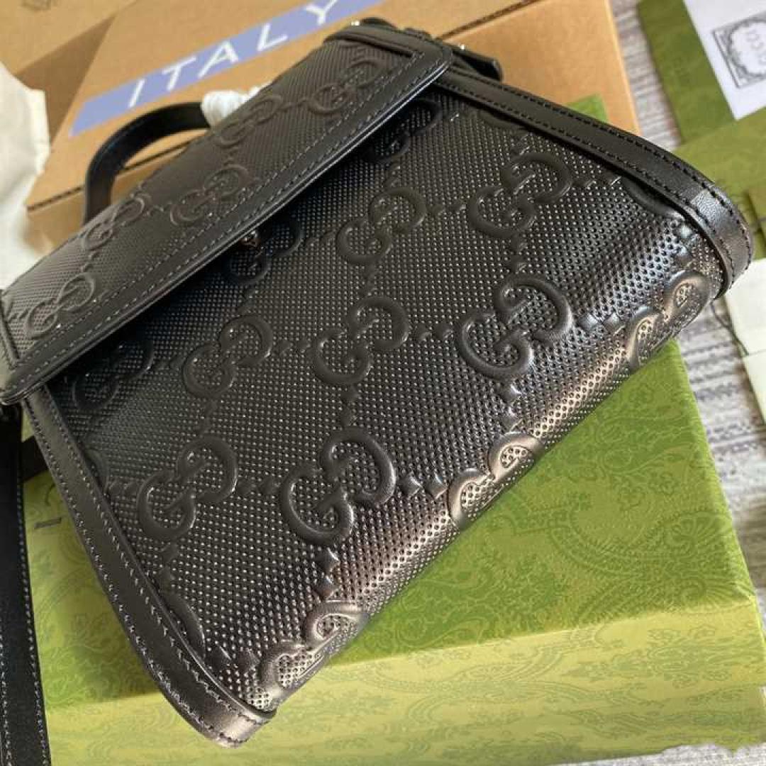 GUCCI GG EMBOSSED MESSENGER BAG BLACK GG EMBOSSED LEATHER COTTON LINEN LINING