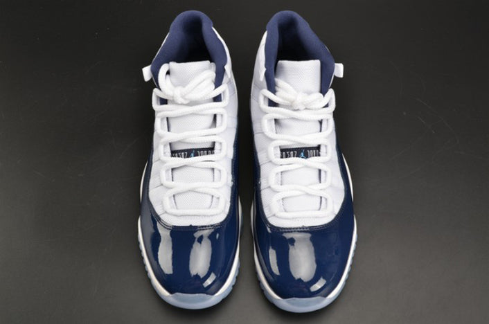AIR JORDAN 11 RETRO "UNC WIN LIKE 82"
