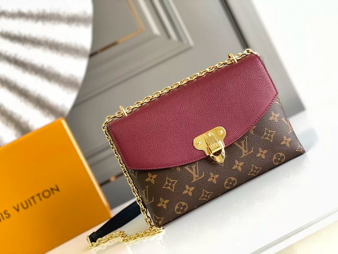 LOUIS VUITTON SAINT PLACIDE HANDBAG, MONOGRAM COATED CANVAS + COLORED GRAIN LEATHER