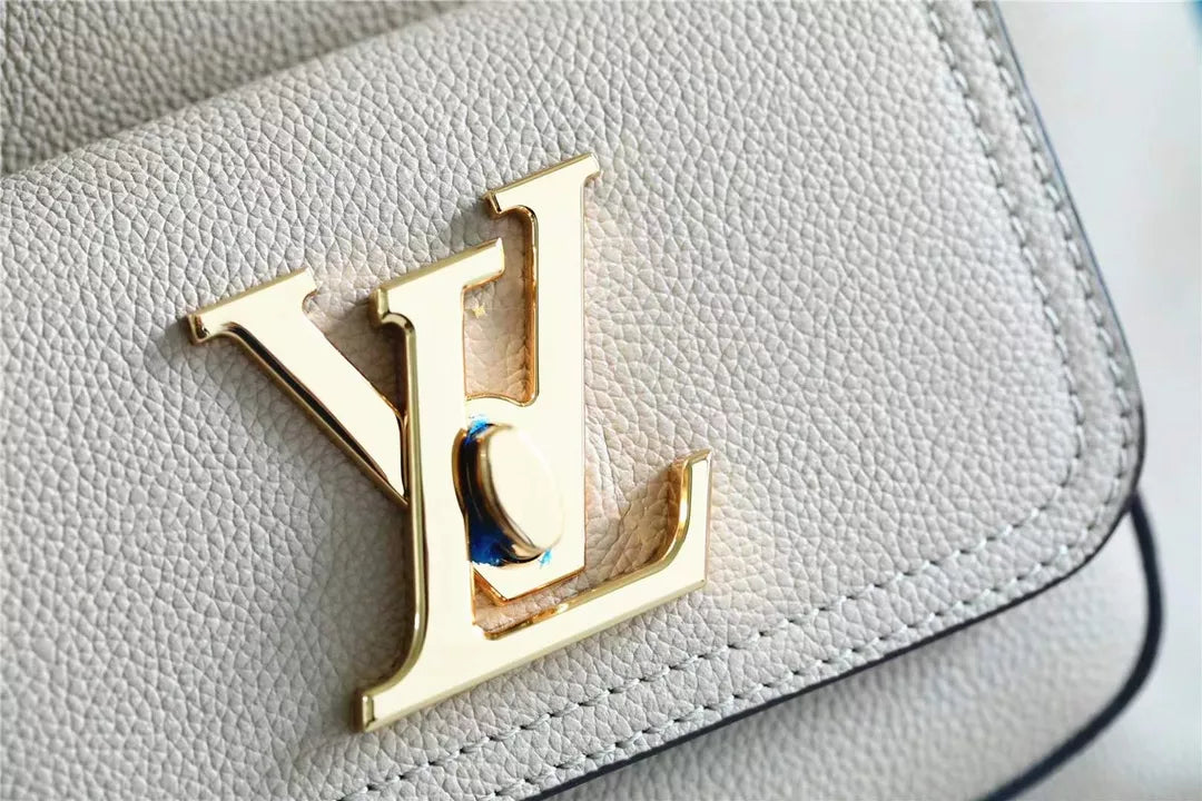 LOUIS VUITTON 9.1 X 9.1 X 6.3 INCHES LOCK ME BUCKET BAG