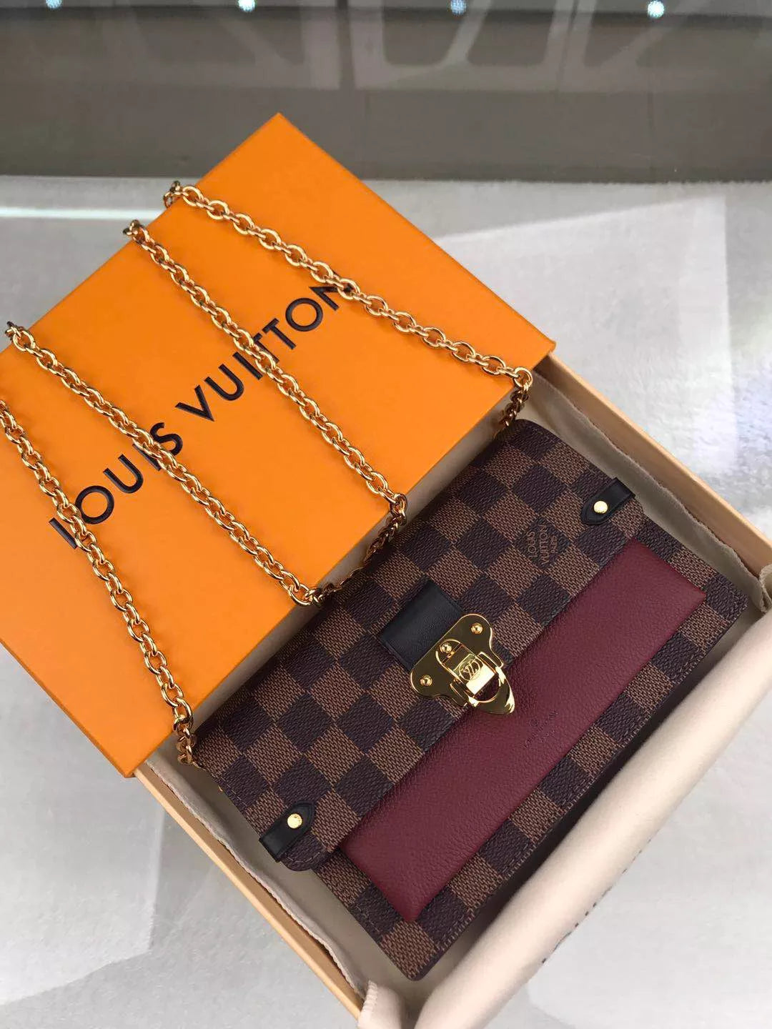 LOUIS VUITTON VAVIN CHAIN WALLET