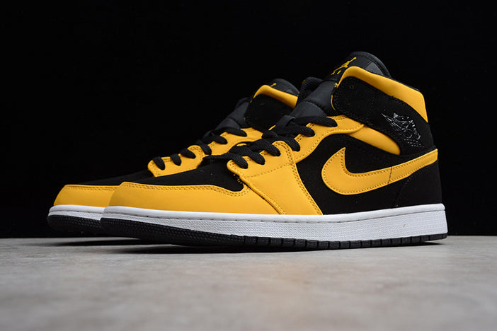 AIR JORDAN 1 MID "BLACK UNIVERSITY GOLD"