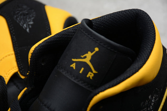 AIR JORDAN 1 MID "BLACK UNIVERSITY GOLD"