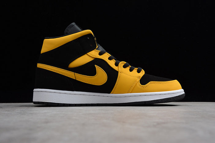 AIR JORDAN 1 MID "BLACK UNIVERSITY GOLD"