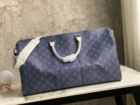 LOUIS VUITTON 50 X 29 X 23 CM KEEPALL BANDOULIÈRE 50 MONOGRAM SOMEWHERE SOMEHOW