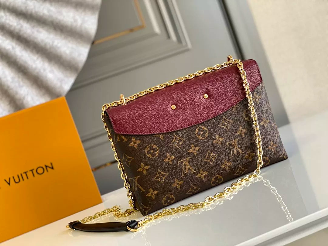 LOUIS VUITTON SAINT PLACIDE HANDBAG, MONOGRAM COATED CANVAS + COLORED GRAIN LEATHER