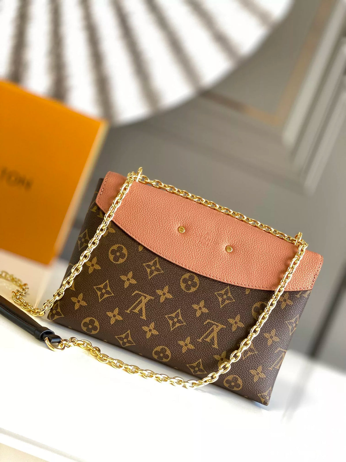 LOUIS VUITTON SAINT PLACIDE HANDBAG, MONOGRAM COATED CANVAS + COLORED GRAIN LEATHER