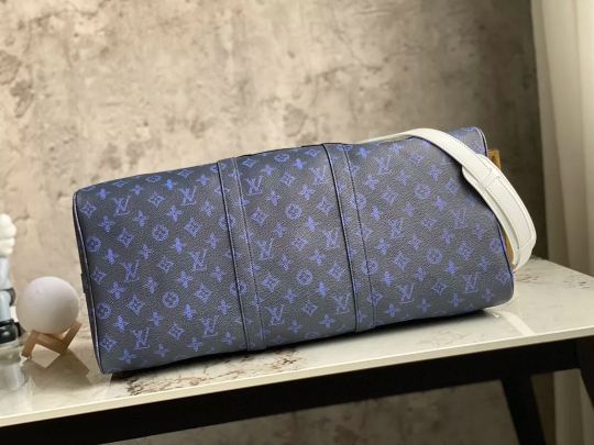 LOUIS VUITTON 50 X 29 X 23 CM KEEPALL BANDOULIÈRE 50 MONOGRAM SOMEWHERE SOMEHOW