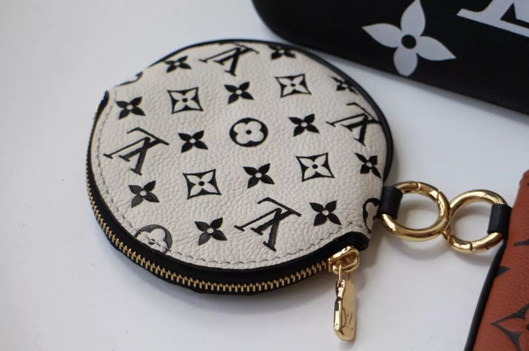 LOUIS VUITTON 19.5 X 11.5 X 3.0 CM CRAFTY TRIO BAG