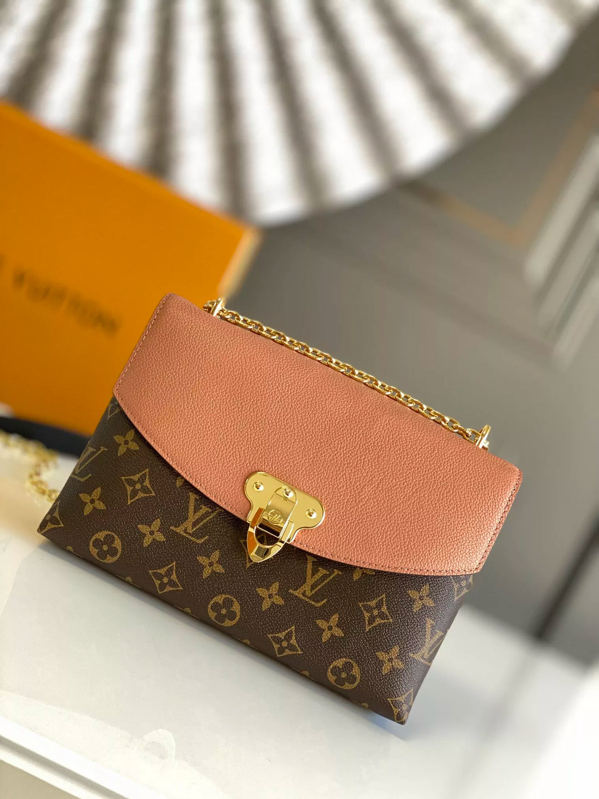 LOUIS VUITTON SAINT PLACIDE HANDBAG, MONOGRAM COATED CANVAS + COLORED GRAIN LEATHER