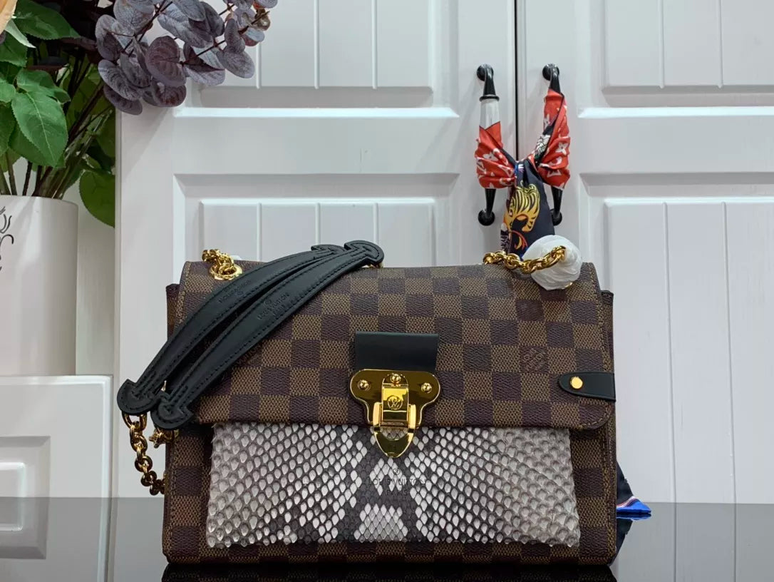 LOUIS VUITTON VAVIN PM 24X17X11 BAG