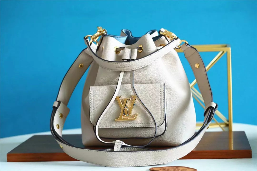 LOUIS VUITTON 9.1 X 9.1 X 6.3 INCHES LOCK ME BUCKET BAG