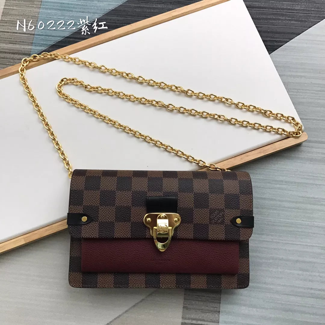 LOUIS VUITTON VAVIN CHAIN WALLET