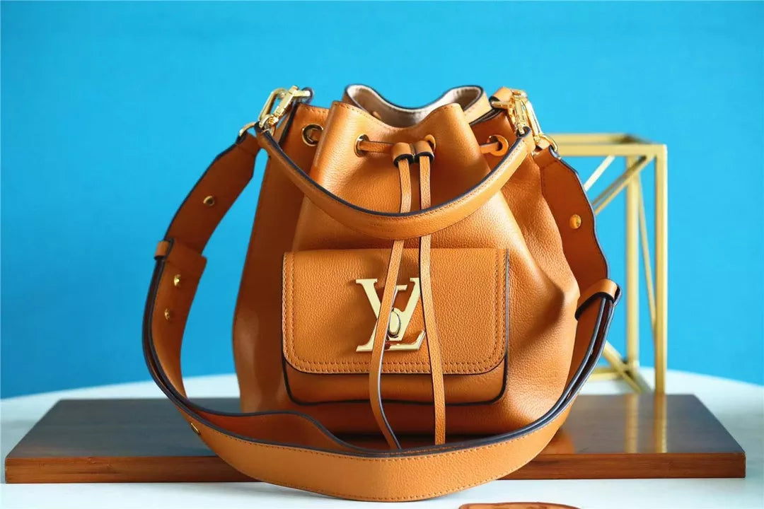LOUIS VUITTON 9.1 X 9.1 X 6.3 INCHES LOCK ME BUCKET BAG