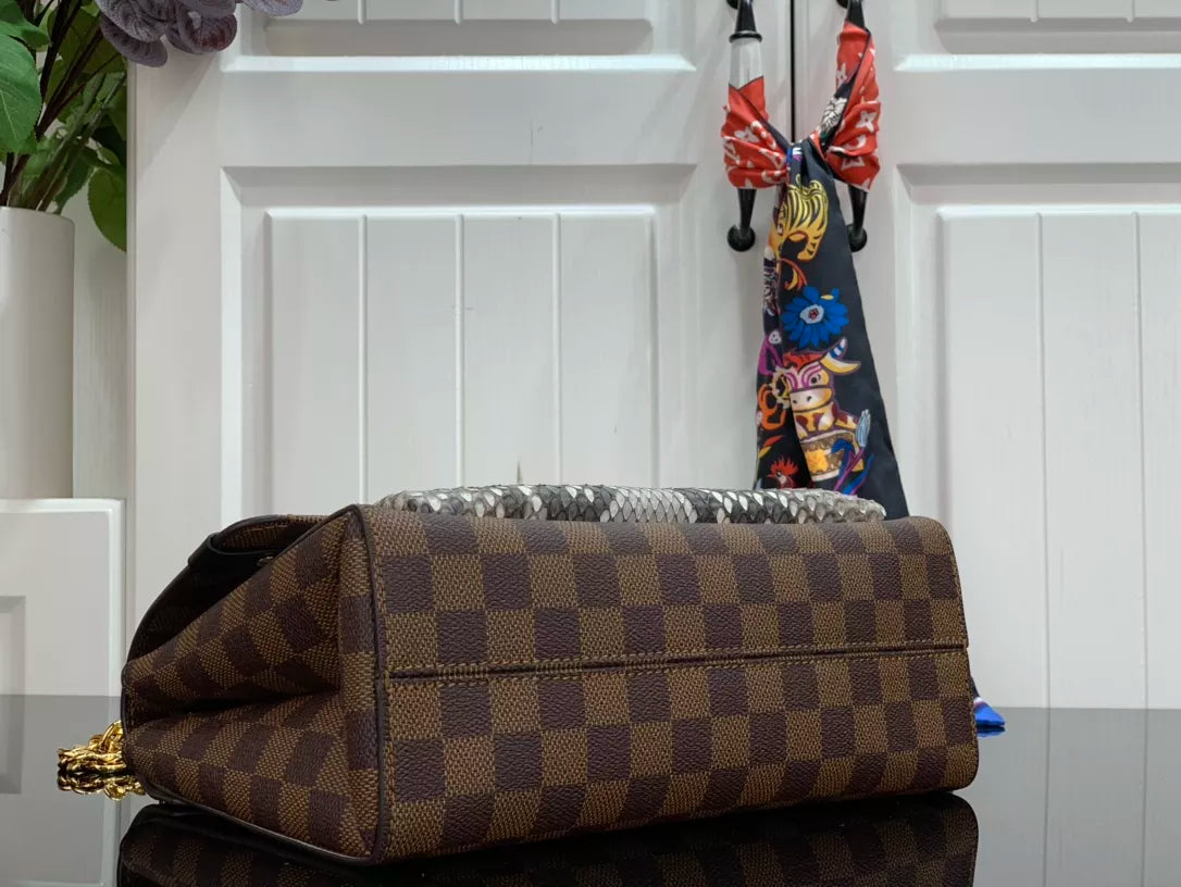 LOUIS VUITTON VAVIN PM 24X17X11 BAG