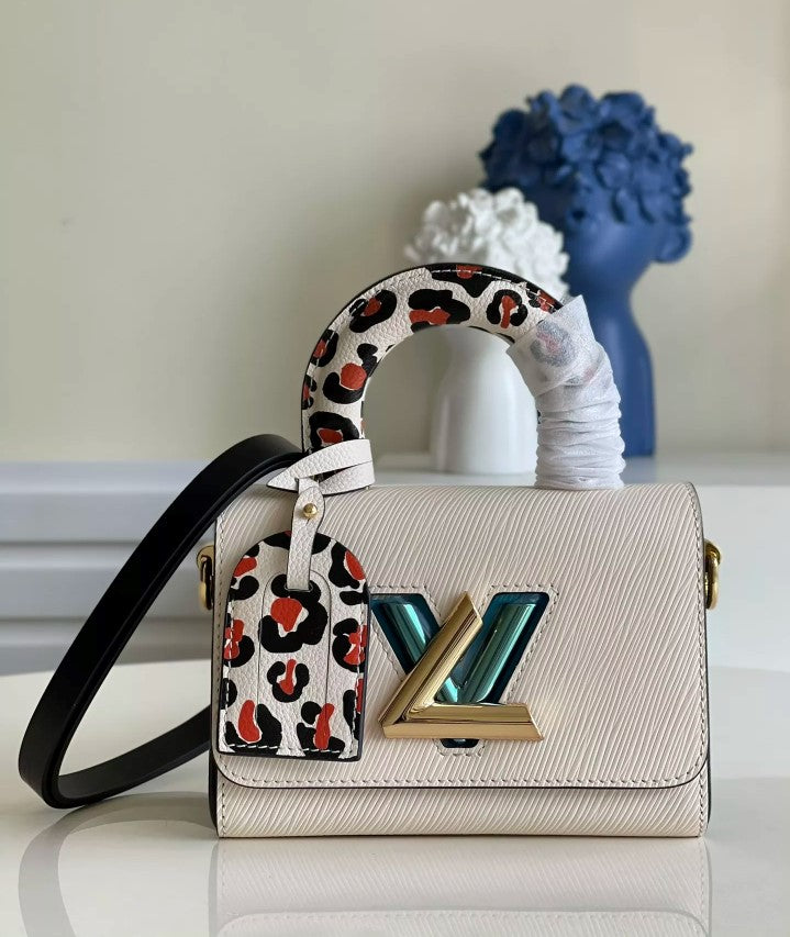 LOUIS VUITTON 19 X 15 X 9CM 23 X 17 X 9.5CM TWIST WILD AT HEART