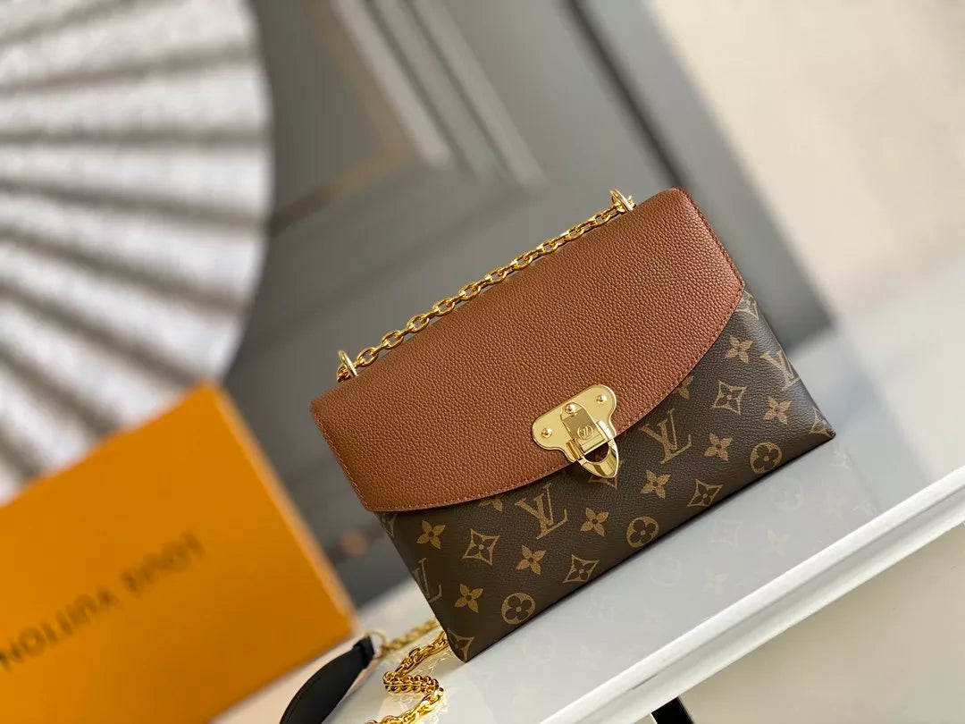 LOUIS VUITTON SAINT PLACIDE HANDBAG, MONOGRAM COATED CANVAS + COLORED GRAIN LEATHER