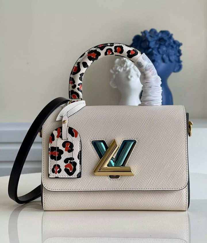 LOUIS VUITTON 19 X 15 X 9CM 23 X 17 X 9.5CM TWIST WILD AT HEART